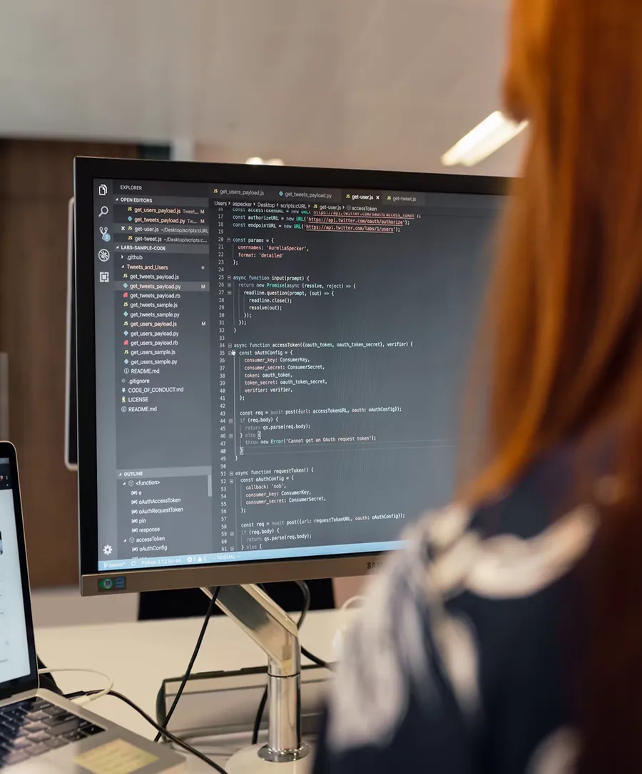 Developer working at a monitor, representing online payments and card security